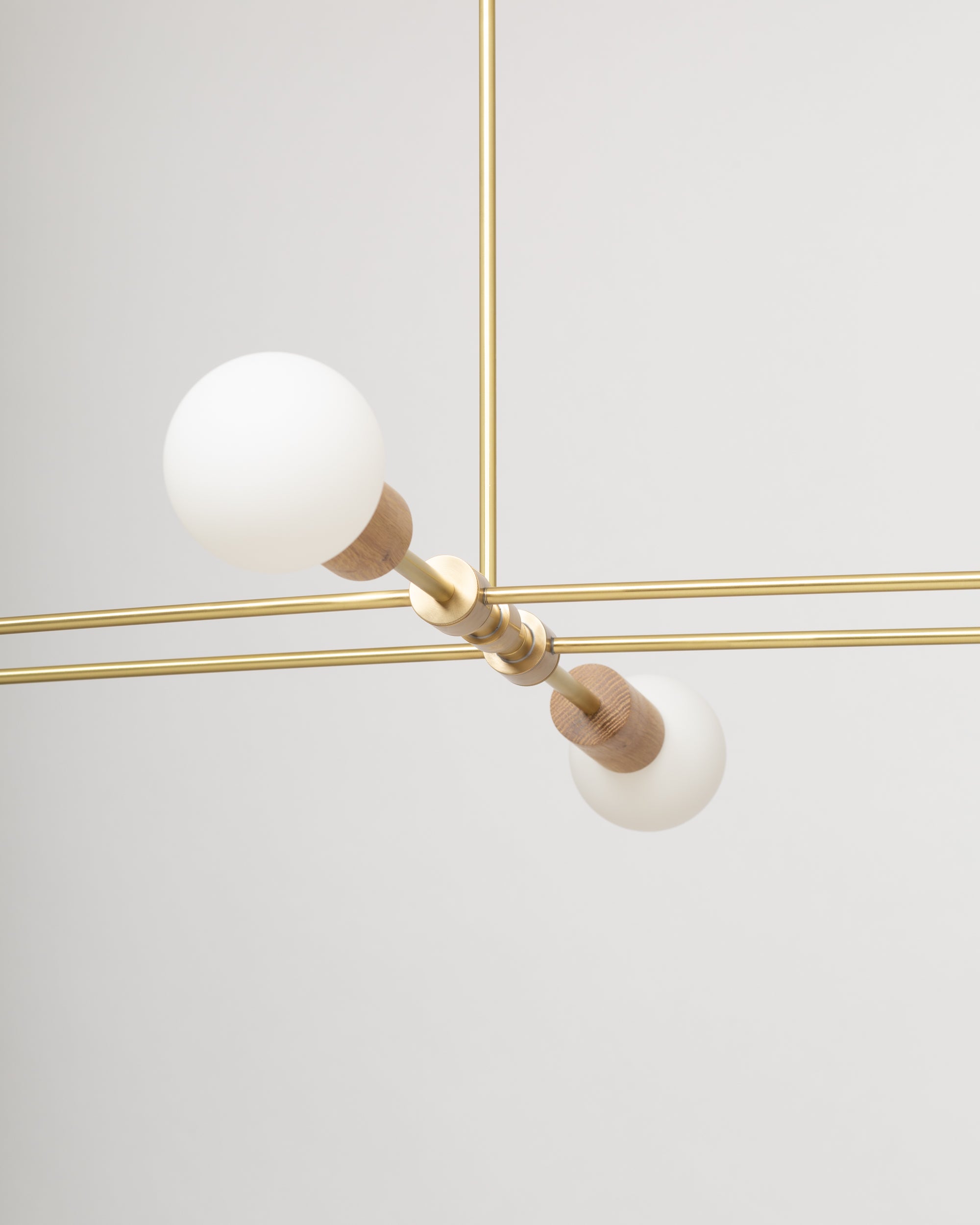 Oslo Six Sphere Dim to Warm Articulating Oak Pendant