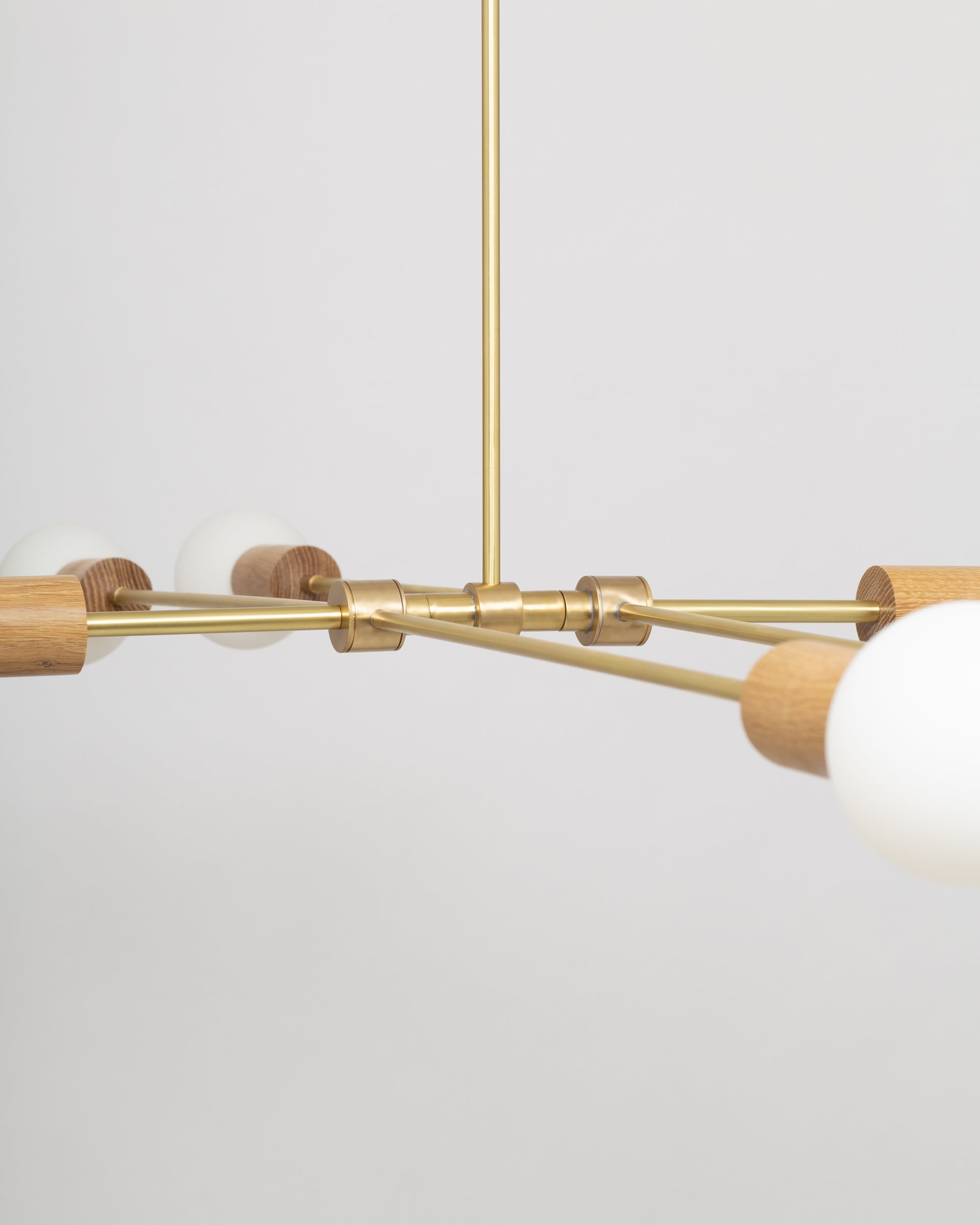 Oslo Six Sphere Dim to Warm Articulating Oak Pendant