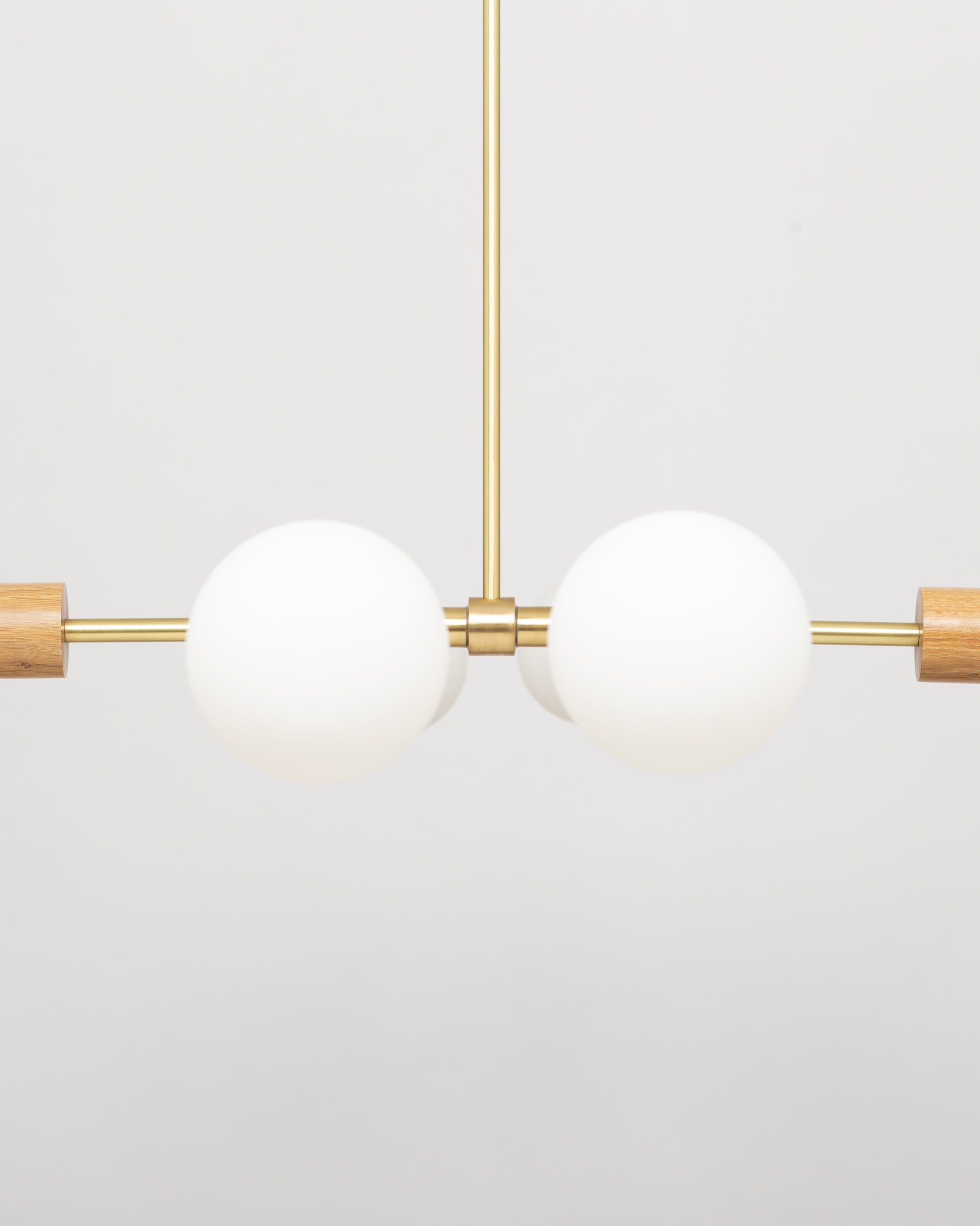 Oslo Six Sphere Dim to Warm Articulating Oak Pendant